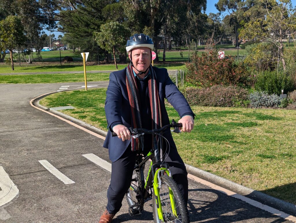 CEO Andy Moutray-Read on a bicycle at the Traffic School